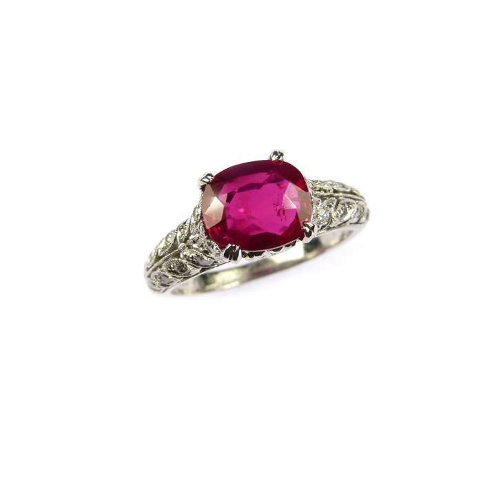 Early 20th century single stone Burma ruby and diamond ring